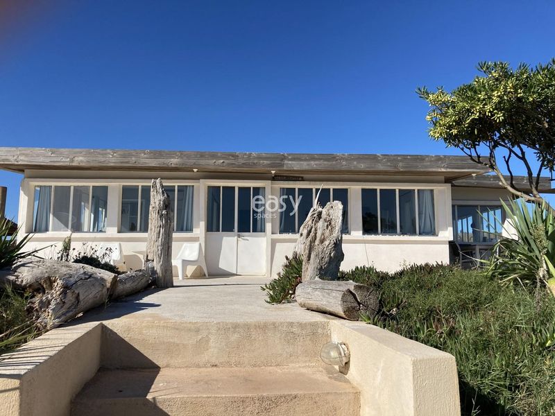 fisherman's hut used for a photo shoot with a sea view from the location