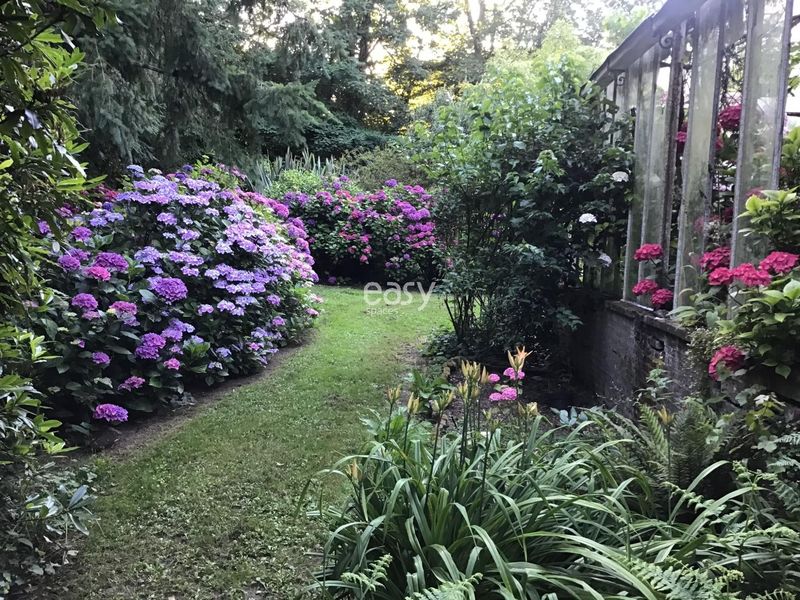 classic house with a beautiful garden located in the northern region of FRANCE