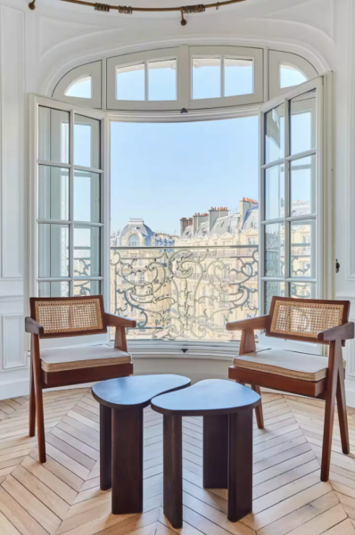 rent an apartment with wooden flooring, decorative moldings, and intricate woodturning details in Paris, FRANCE