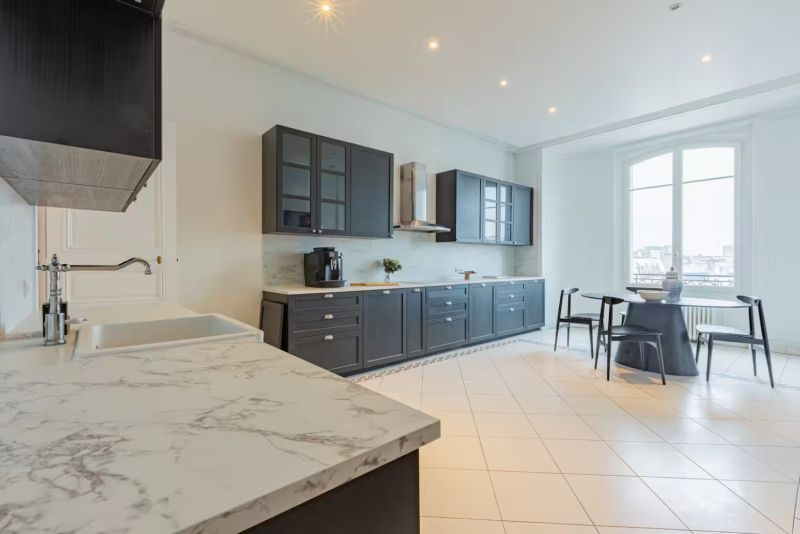 rent an apartment with a balcony offering a breathtaking view over the roofs of Paris in FRANCE