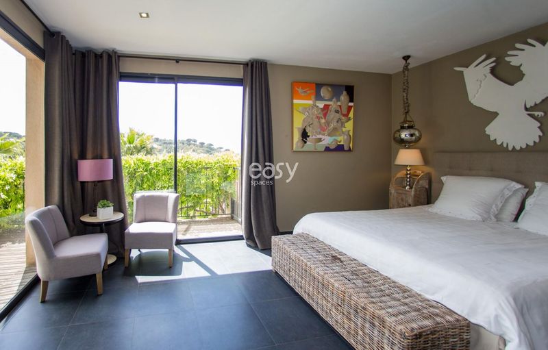 Modern house bedroom perfectly designed for photo shoots and film shootings in Saint Tropez, offering a stylish and comfortable atmosphere