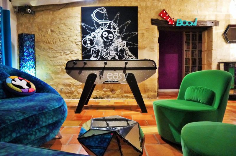 colorful living room setting specifically designed for a professional Bordeaux-themed photoshoot