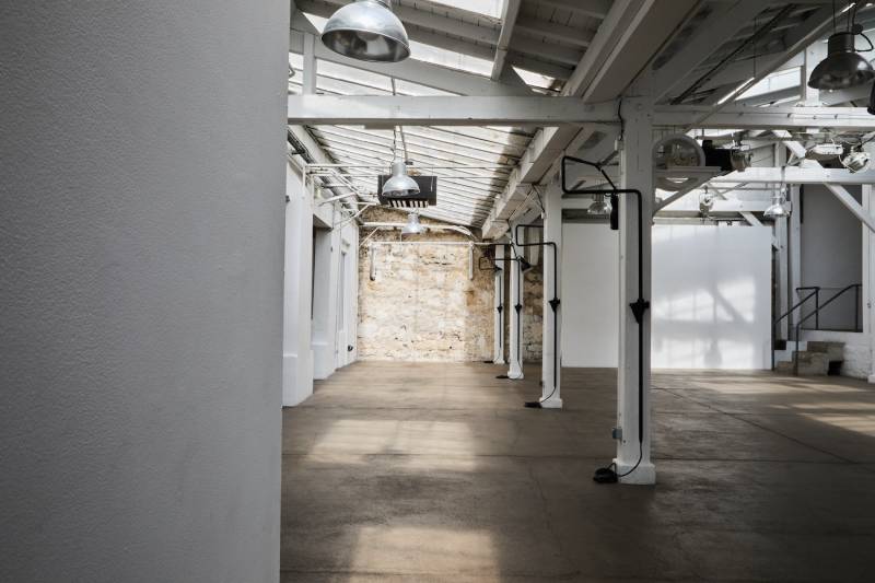 rent an industrial location for a car photoshoot in Paris, FRANCE with ample space and authentic urban backdrop