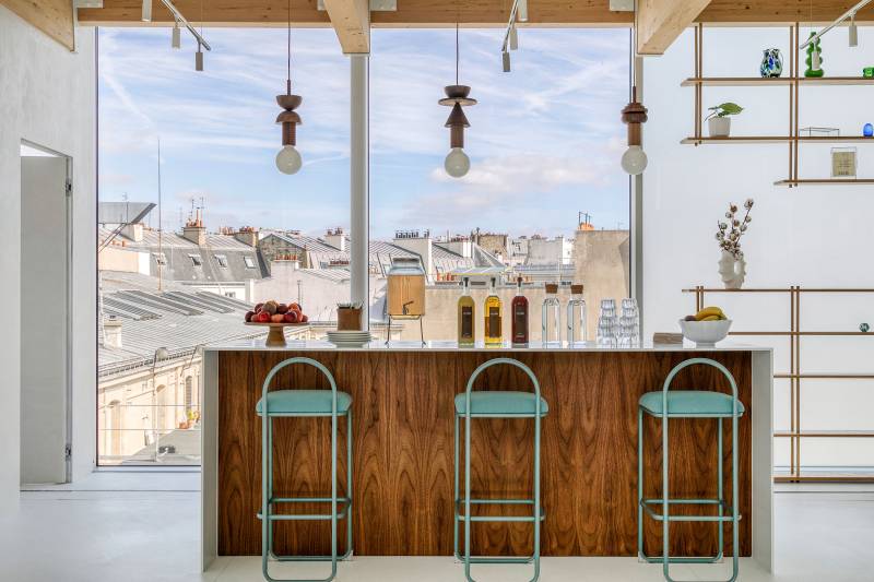 Filming location with a panoramic view over the rooftops of Paris, France, showcasing the iconic city skyline