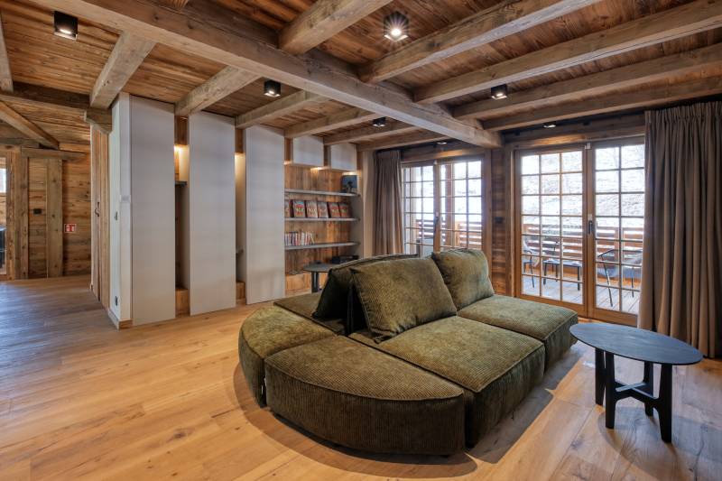 Detailed description of the specific location chosen for the professional photo shoot in Megève, FRANCE