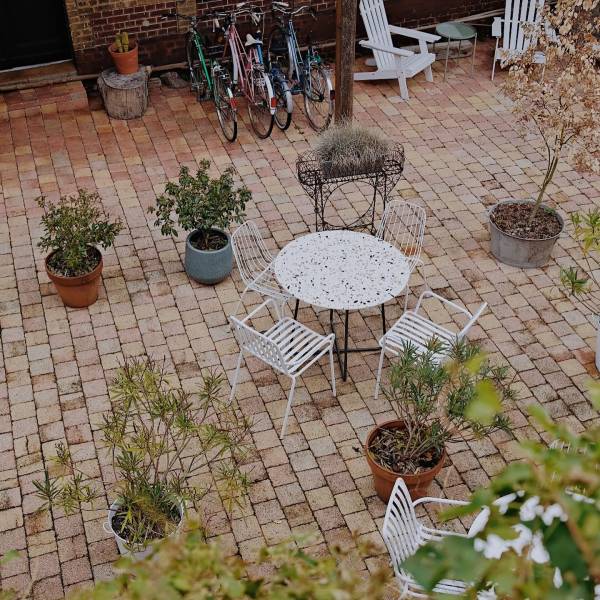 Outdoor photoshoot location featuring garden furniture in Normandy region of France