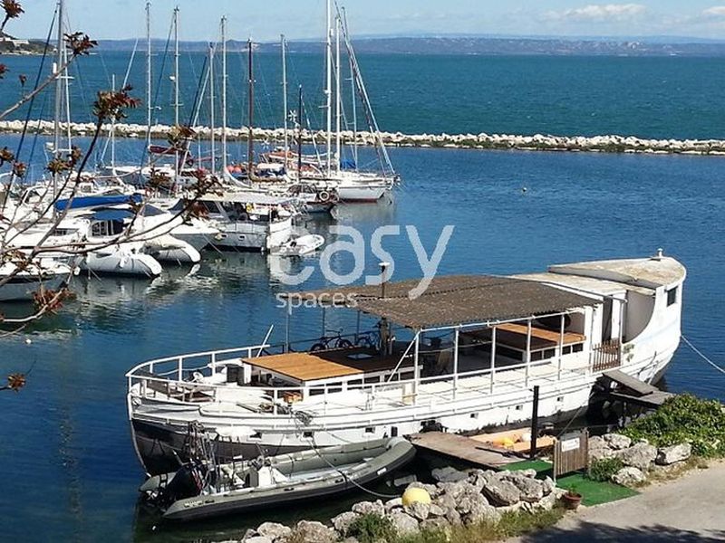 rent a traditional fishing boat for an authentic and picturesque photo session