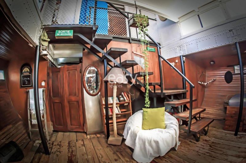 Rent a small boat specifically for filming purposes and shooting scenes